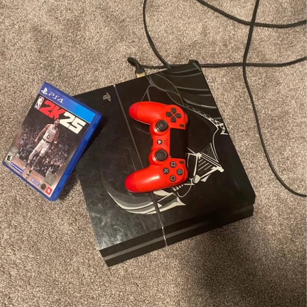 Black Gaming Console with Red Controller